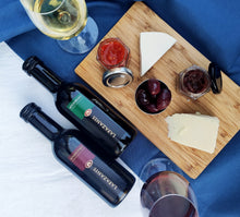 Load image into Gallery viewer, Selection of Greek dry white wine Moschofilero, dry red wine Agiorgitiko, cheese, olives and chytney
